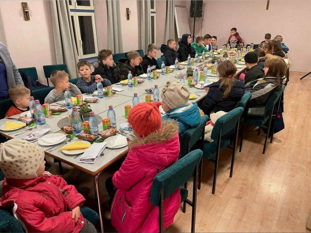 Children from an orphanage in Kyiv, Ukraine, look forward to dinner with United Methodists in Sibiu, Romania, after a 48-hour ordeal in which they narrowly escaped abduction. Photo: courtesy of the Romanian UMC